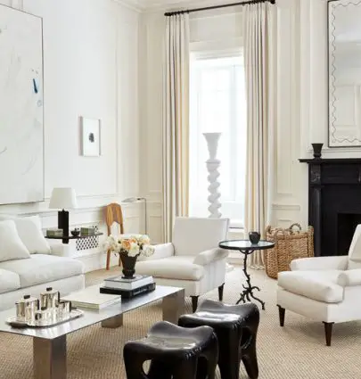 White living room design with layers of cream, tan, and black in New York townhouse with tall ceilings by Alyssa Kapito on Thou Swell #