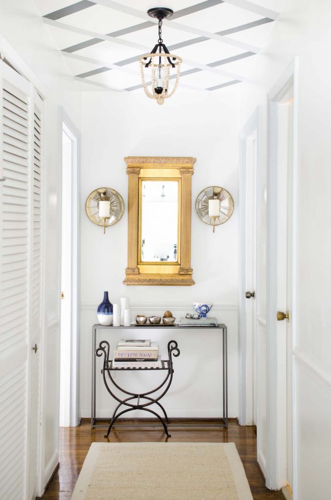 Hallway makeover with gold mirror and lattice ceiling stripes via Thou Swell @thouswellblog