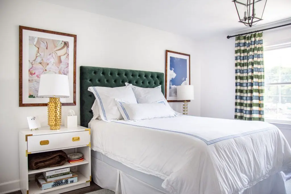Bedroom design with green velvet headboard, embroidered bedding, and striped curtains by Kevin O'Gara on Thou Swell #bedroom #bedroomdesign #bedroomdecor #interiordesign #atlanta #buckhead #atlantahome #bedroomdecor #decorating #interior